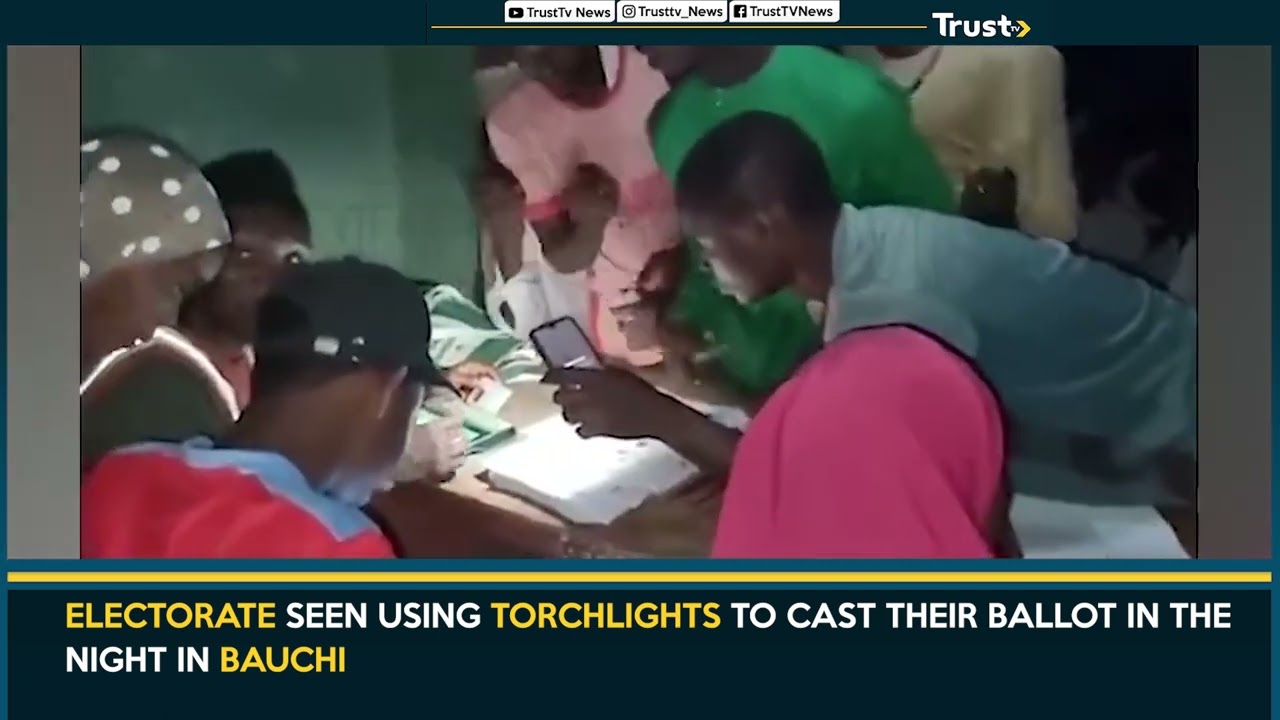 Electorate Seen Using Torchlights To Cast Their Ballot In The Night In Bauchi