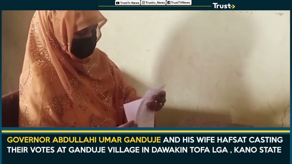 Governor Abdullahi Umar Ganduje And His Wife Hafsat Casting Their Votes At Ganduje Village